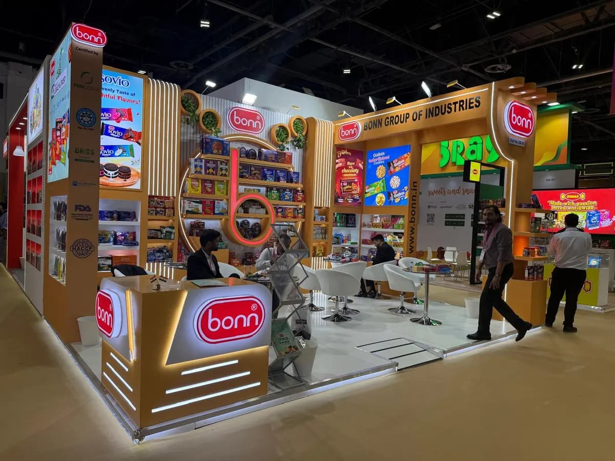 Bonn Group island stand with wooden frame, product shelving and meeting area at ISM Middle East 2025