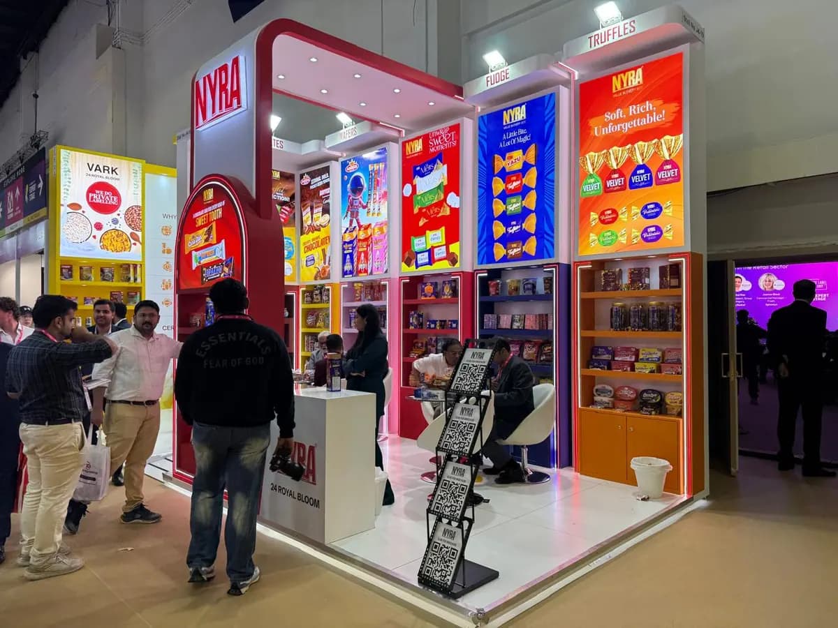 Nyra stand with colourful backlit product columns and brochure stand at ISM Middle East 2025