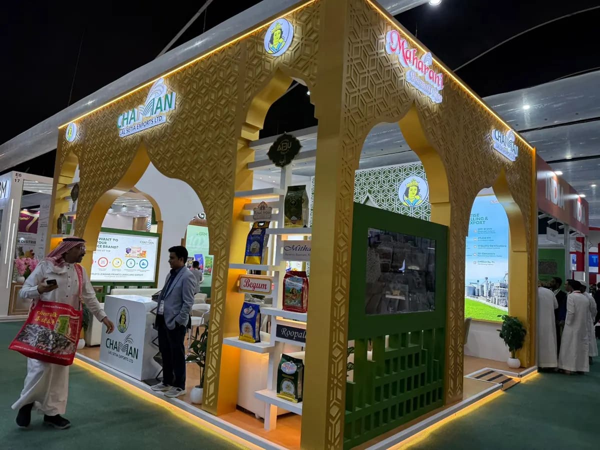 Chaman Lal gold arched stand with lattice panels and rice product shelving at The Saudi Food Show 2025