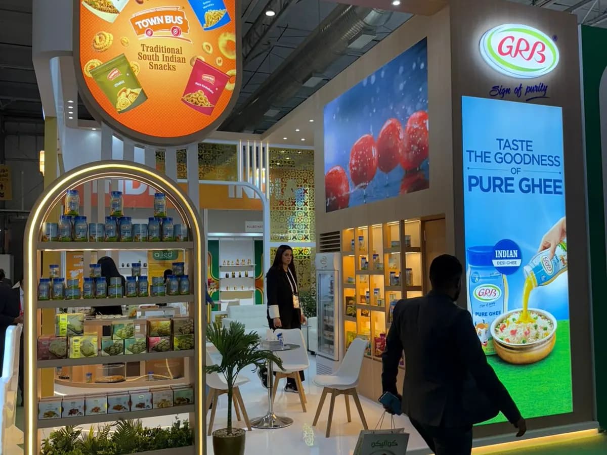 GRB ghee and snacks stand with arched shelf unit and LED panels at The Saudi Food Show 2025